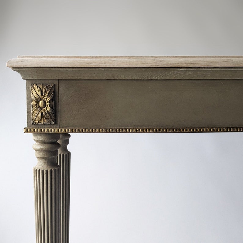 Neoclassical Console Table with Central Medallion and Fluted Columns Console Table