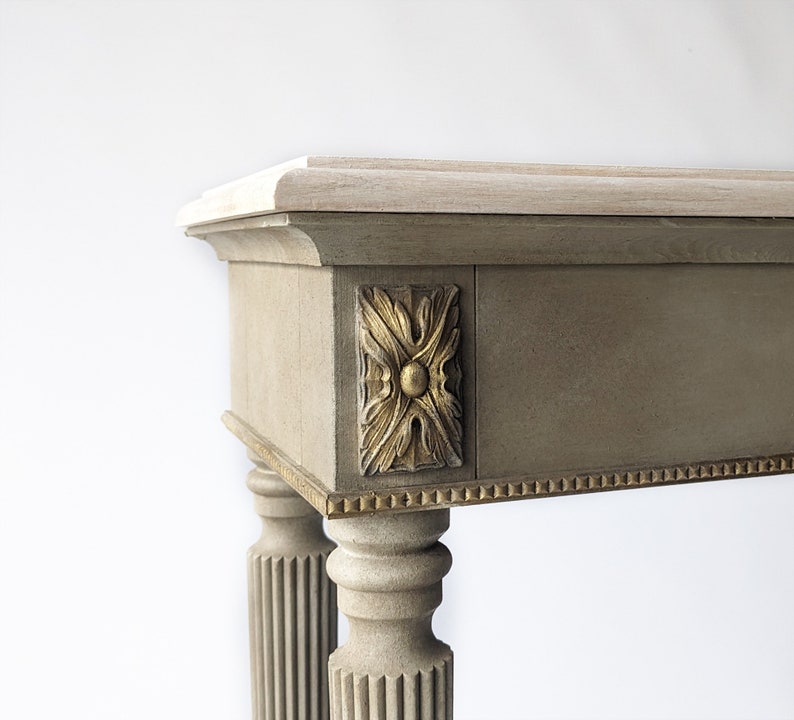 Neoclassical Console Table with Central Medallion and Fluted Columns Console Table