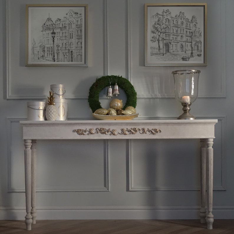 Elegant White Console Table with Hand-Carved Floral Details and Fluted Columns Console Table